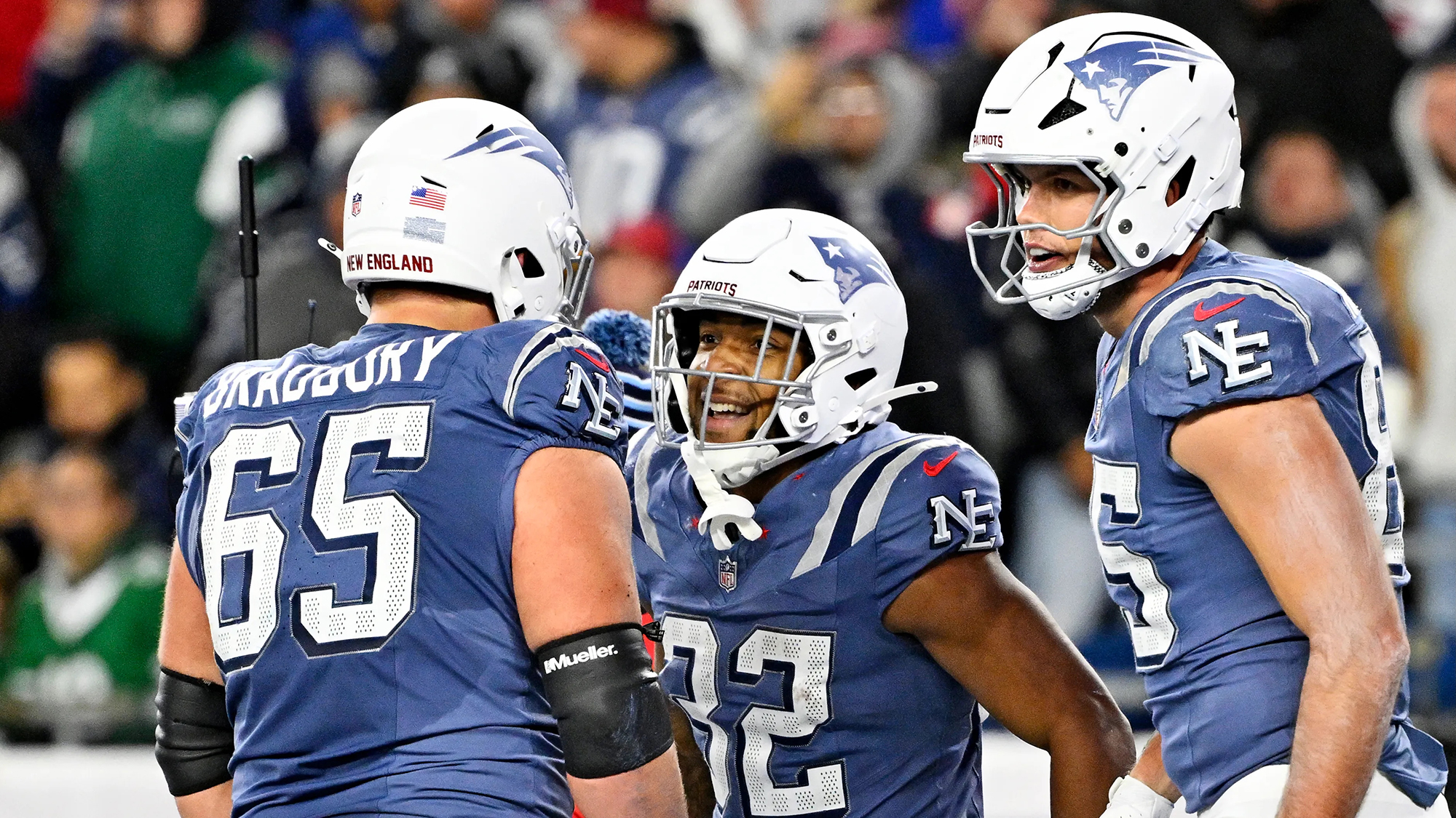 Bradbury, Henderson and Henry celebrate in Patriots Storm Blue uniforms