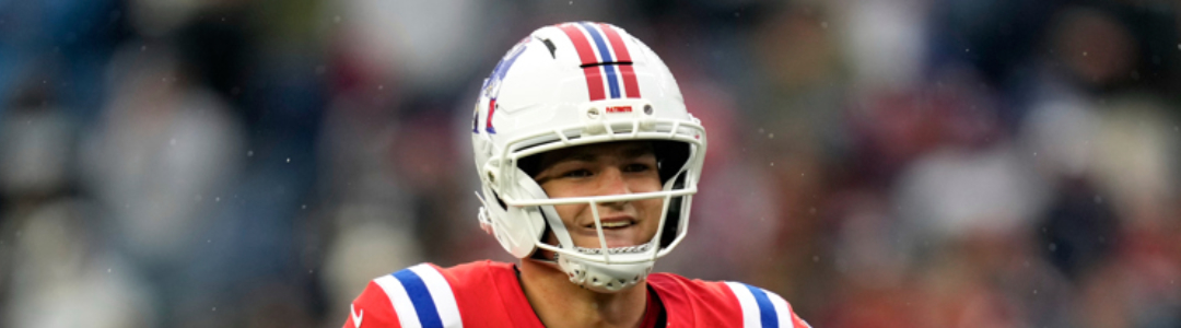 Drake Maye smiling because of his sick throwback threads